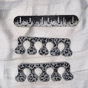 Nail file toe separation manicure pedicure mani pedi NYC New York City skyline